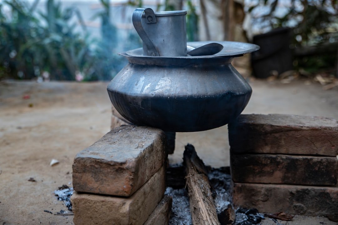A Moka pot on a stovetop, highlighting common brewing mistakes like incorrect water levels and heat settings for perfect coffee.