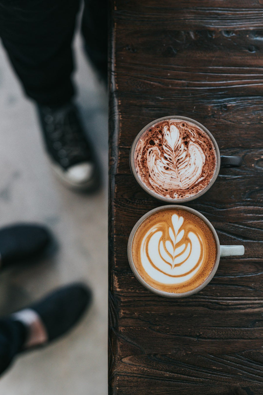 Scandinavian coffee culture highlighted, showcasing cozy cafes, people enjoying coffee, and traditional brewing methods emphasizing their high consumption rates.