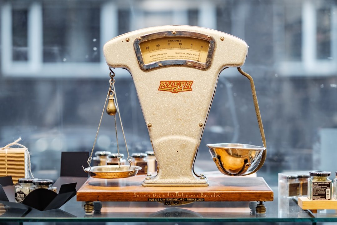 A coffee expert measuring coffee grounds and water, illustrating the ratio debate for optimal brew strength in coffee preparation.