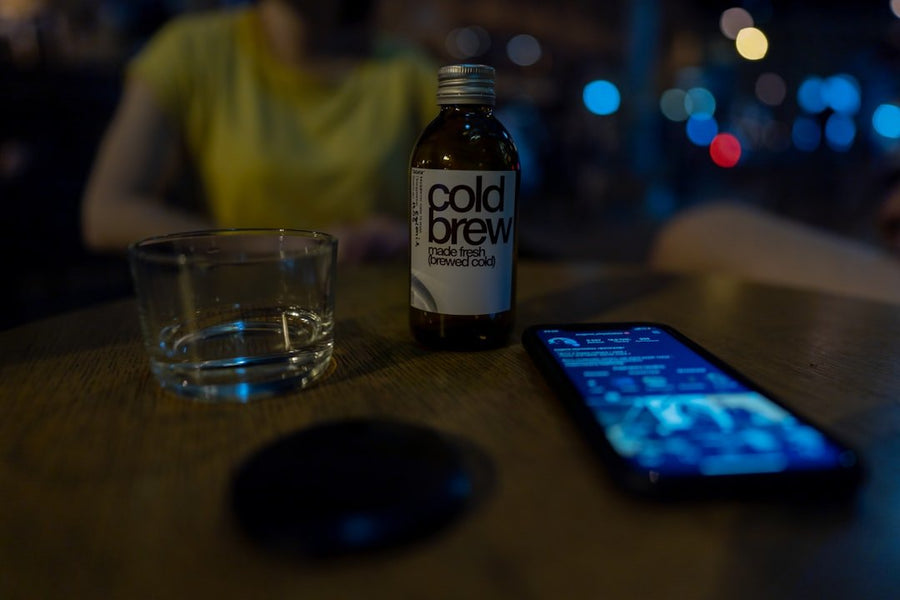 A split image comparing cold brew and Americano coffee drinks, highlighting their unique characteristics and popularity trends for 2026.