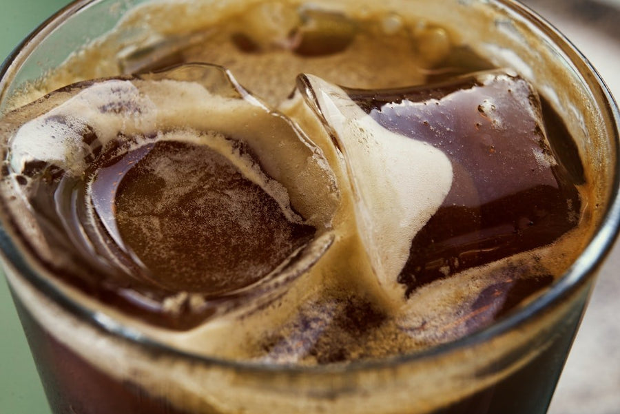 A glass of iced coffee made with instant coffee, showcasing a refreshing beverage perfect for quick, budget-friendly enjoyment.