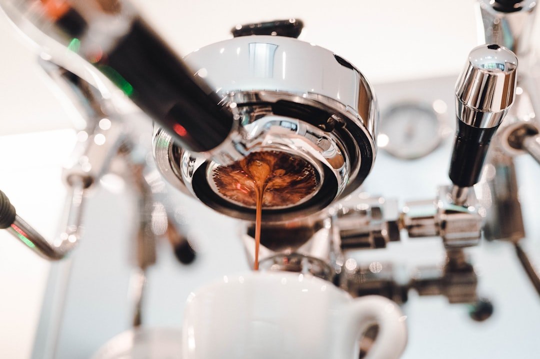 A refreshing Freddo Espresso served in a glass, showcasing Greece's popular cold coffee culture with rich, frothy crema.