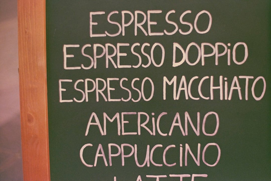 A barista prepares a doppio espresso shot, highlighting the challenges and nuances of achieving the perfect extraction in Italy.