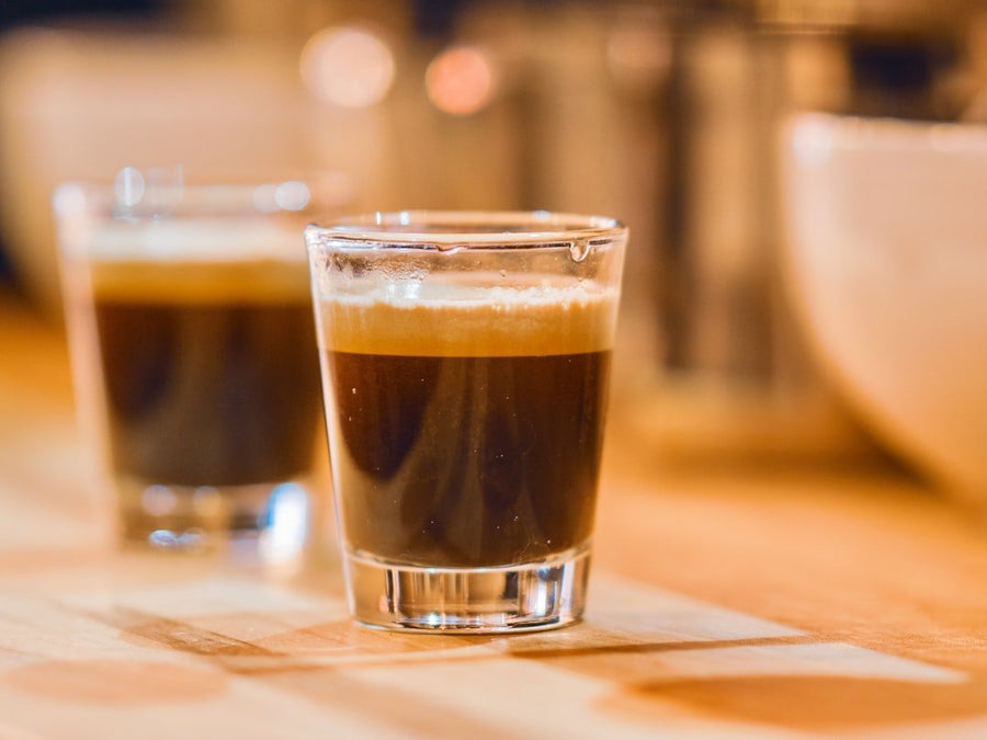 A close-up of a ristretto shot in a small cup, highlighting its rich crema and concentrated flavor profile.