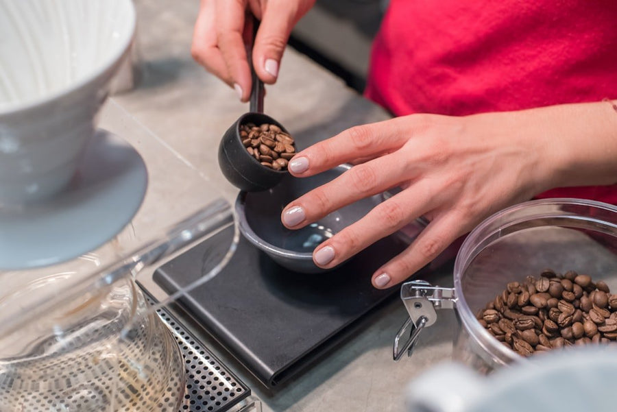 Close-up of a refractometer measuring coffee concentration, highlighting its importance for coffee experts in brewing precision.