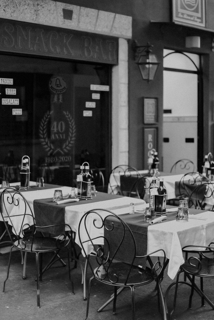 A steaming cup of espresso on a café table, symbolizing Italy's daily coffee ritual and cultural significance.