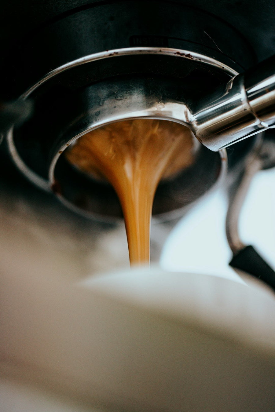 A refreshing glass of Freddo Coffee showcasing iced espresso, highlighting its smooth texture and rich flavor profile.