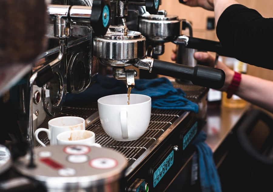A refreshing cup of Freddo Coffee, showcasing Greece's signature cold espresso served over ice, highlighting its rich flavor and creamy texture.