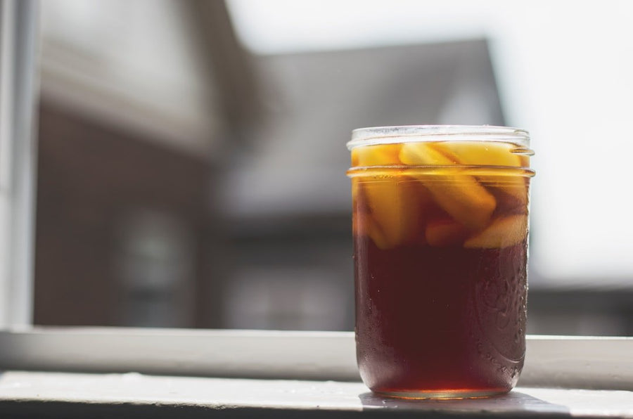 A side-by-side comparison of iced americano and iced coffee, highlighting their environmental impact and sustainability factors.