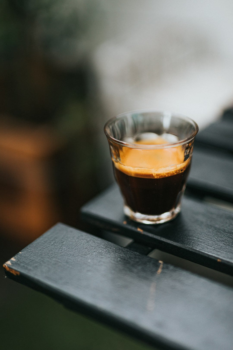 A refreshing Freddo Espresso served in a glass, showcasing Greece's popular iced coffee culture and its unique preparation method.
