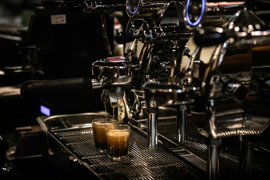 A refreshing Freddo Espresso served in a glass, showcasing Greece's popular iced coffee culture and its unique preparation method.